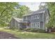 Charming two-story home featuring a well-manicured lawn and lush landscaping adding to its curb appeal at 2334 Dawn Trl, Durham, NC 27712