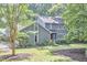 Inviting two-story home with neat landscaping and a well-maintained lawn creates a welcoming atmosphere at 2334 Dawn Trl, Durham, NC 27712