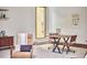 Inviting rec room with a game table, accent chair, and a comfortable, relaxed atmosphere at 2334 Dawn Trl, Durham, NC 27712
