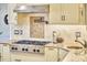 Gourmet kitchen features stainless steel appliances, custom tile backsplash at 2334 Dawn Trl, Durham, NC 27712