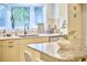 Bright kitchen features granite countertops, stainless steel appliances and natural light at 2334 Dawn Trl, Durham, NC 27712