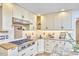 Well-organized kitchen with granite counters and updated appliances at 2334 Dawn Trl, Durham, NC 27712
