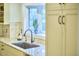 Bright kitchen features granite countertops, stainless steel sink, and natural light at 2334 Dawn Trl, Durham, NC 27712