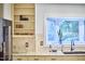 Well-lit kitchen features granite countertops, and ample storage space at 2334 Dawn Trl, Durham, NC 27712