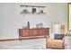 Cozy living room design with wooden shelves and vintage furniture for a comfy feel at 2334 Dawn Trl, Durham, NC 27712