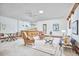 Spacious living room with a wet bar, perfect for entertaining and relaxation at 2334 Dawn Trl, Durham, NC 27712