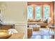 Cozy living room featuring multiple windows and comfortable seating at 2334 Dawn Trl, Durham, NC 27712