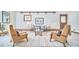 Bright living room features comfortable seating, and stylish decor, perfect for gatherings at 2334 Dawn Trl, Durham, NC 27712