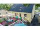 Backyard deck with an umbrella, chairs and table for outdoor seating and entertaining at 2410 Wade Hampton Rd, Hillsborough, NC 27278