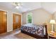 Bedroom with hardwood floors, large windows and a closet perfect for storage solutions at 2410 Wade Hampton Rd, Hillsborough, NC 27278