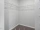 Walk in closet with wire shelving and carpet at 2769 Cassius Dr, Apex, NC 27502