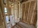 Bathroom framing with visible piping and stud walls allows customizable design at 29 Chloe Ct, Selma, NC 27576