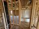 Unfinished bathroom featuring stud walls and a white tub at 29 Chloe Ct, Selma, NC 27576