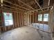 Bedroom framing with large windows allows for lots of natural light and a custom design at 29 Chloe Ct, Selma, NC 27576