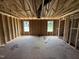 Bedroom framing with large windows allows for lots of natural light and a custom design at 29 Chloe Ct, Selma, NC 27576