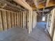 Unfinished living room featuring stud walls and a concrete floor at 29 Chloe Ct, Selma, NC 27576