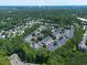 Aerial view of community featuring lush trees and views of downtown Raleigh, NC, in the distance at 2920 Barrymore St # 106, Raleigh, NC 27603
