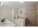 Bathroom featuring a tub, stand up shower, and modern fixtures at 2920 Barrymore St # 106, Raleigh, NC 27603