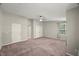 Spacious bedroom featuring neutral walls, plush carpet, and a ceiling fan for added comfort at 2920 Barrymore St # 106, Raleigh, NC 27603