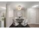 Cozy dining area with a round table and seating for four at 2920 Barrymore St # 106, Raleigh, NC 27603