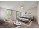 Bright main bedroom featuring neutral walls, carpet, a ceiling fan and plenty of natural light at 2920 Barrymore St # 106, Raleigh, NC 27603