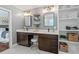 Bathroom featuring a double vanity, storage, and stylish fixtures at 3 White Ash Dr, Durham, NC 27712