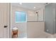 Updated bathroom featuring a glass shower with white subway tile at 3 White Ash Dr, Durham, NC 27712