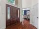 Inviting foyer featuring hardwood floors and a view into the dining room at 3 White Ash Dr, Durham, NC 27712