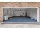 Spacious, clean two-car garage with ample storage space, perfect for vehicles and projects at 3 White Ash Dr, Durham, NC 27712