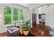 Bright office space with natural light from large windows and hardwood floors at 3 White Ash Dr, Durham, NC 27712