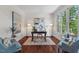 Elegant home office with ample natural light, hardwood floors and neutral decor at 3 White Ash Dr, Durham, NC 27712