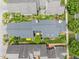 An overhead view showcasing a community of homes with manicured lawns and a peaceful ambiance at 31 W Madison, Pittsboro, NC 27312