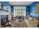 Bright living room showcasing a fireplace with built-ins and a large window with natural light at 31 W Madison, Pittsboro, NC 27312