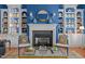 Cozy living room with a fireplace, custom built-ins, and stylish furnishings at 31 W Madison, Pittsboro, NC 27312