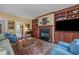 Inviting living room with built-in bookshelves, a fireplace, and comfortable seating at 31 W Madison, Pittsboro, NC 27312