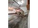 Spacious garage with built-in shelving, providing ample storage and organization options at 3300 Barnsley Ln, Raleigh, NC 27604