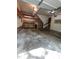 Garage featuring a concrete floor and a shelving unit at 3300 Barnsley Ln, Raleigh, NC 27604
