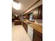 Cozy kitchen features wood cabinets, wood countertops, and an open layout overlooking another room at 3300 Barnsley Ln, Raleigh, NC 27604