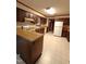 Classic kitchen with wood cabinets, essential appliances, and a practical design for culinary activities at 3300 Barnsley Ln, Raleigh, NC 27604