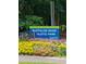 Buffaloe Road Athletic Park sign surrounded by colorful flowers with a park setting at 3300 Barnsley Ln, Raleigh, NC 27604