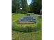 Sign for the Southall Swim & Racquet Club encircled by lush greenery at 3300 Barnsley Ln, Raleigh, NC 27604