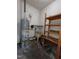 Utility room featuring a water heater and a shelving unit at 3300 Barnsley Ln, Raleigh, NC 27604