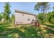 Expansive backyard with a wooden deck, offering a great space for entertaining and outdoor enjoyment at 40 Otter Ct, Youngsville, NC 27596