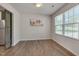 Bright dining area features hardwood floors and a window with natural light at 40 Otter Ct, Youngsville, NC 27596