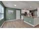 Stylish kitchen featuring stainless steel appliances, granite countertops, and ample cabinet space at 40 Otter Ct, Youngsville, NC 27596