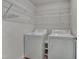 Laundry room featuring white shelving, a washer, and a dryer at 40 Otter Ct, Youngsville, NC 27596