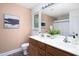 Bathroom featuring double vanity and natural light at 404 Denton St, Durham, NC 27713