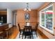 Dining area with hardwood floors and a large window at 404 Denton St, Durham, NC 27713