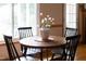 Dining area features hardwood floors with a large window at 404 Denton St, Durham, NC 27713