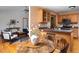 Open concept kitchen/dining area with adjacent sitting room area at 404 Denton St, Durham, NC 27713